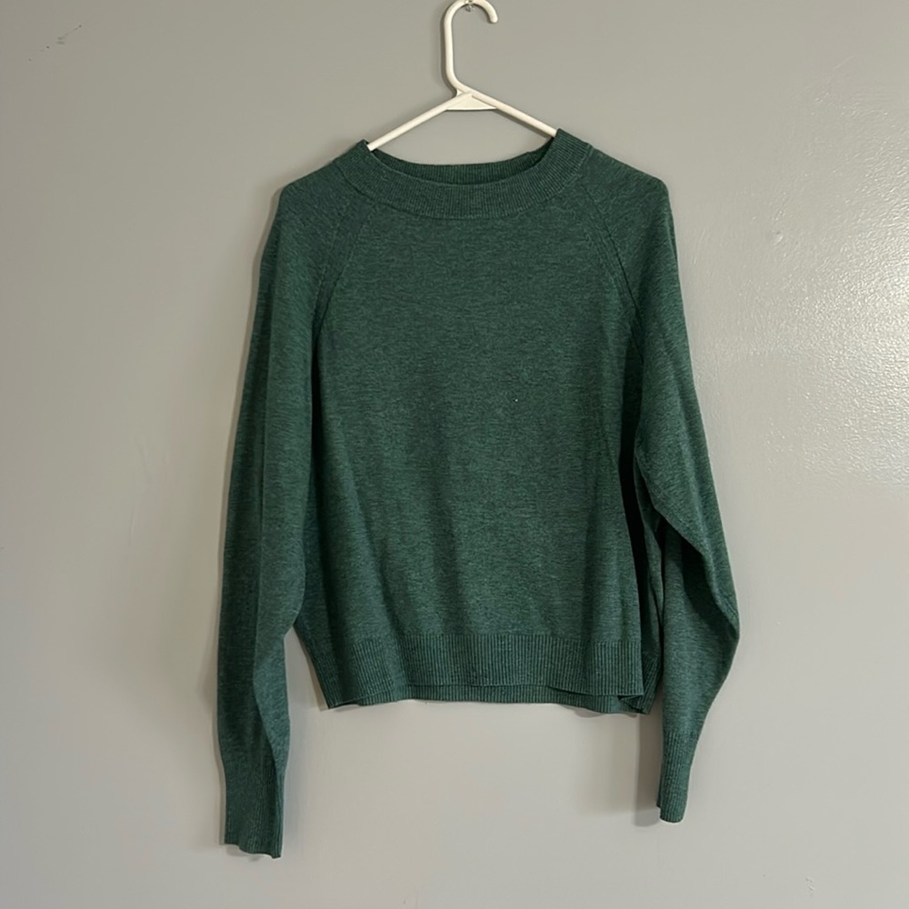green sweater